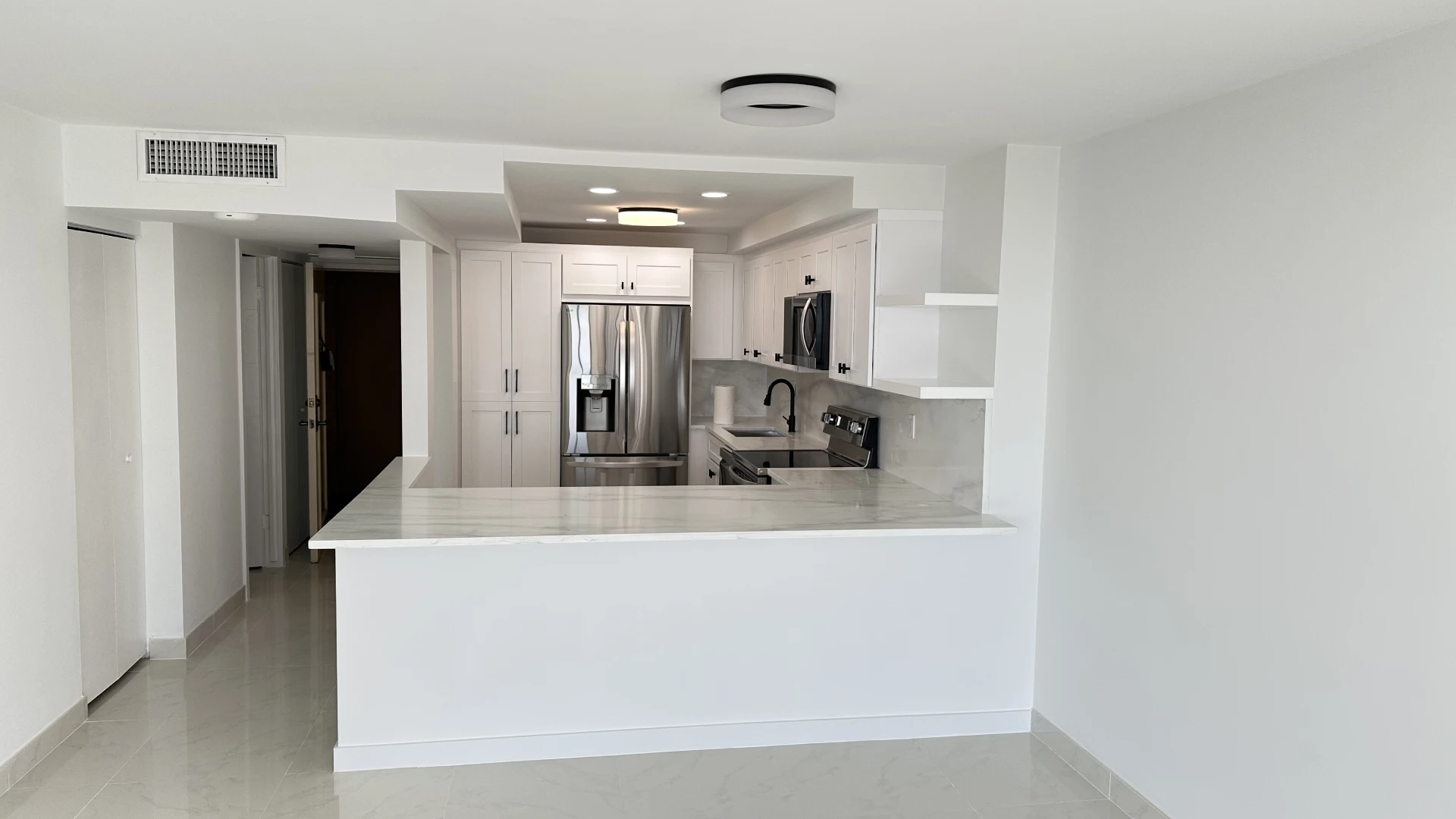 Kitchen and living area after remodeling
