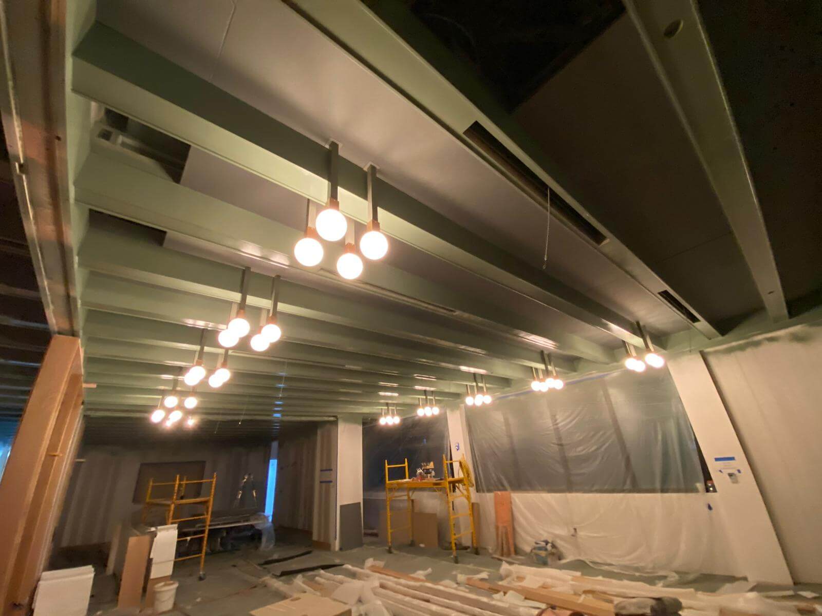 Restaurant ceiling with pendant lighting installed